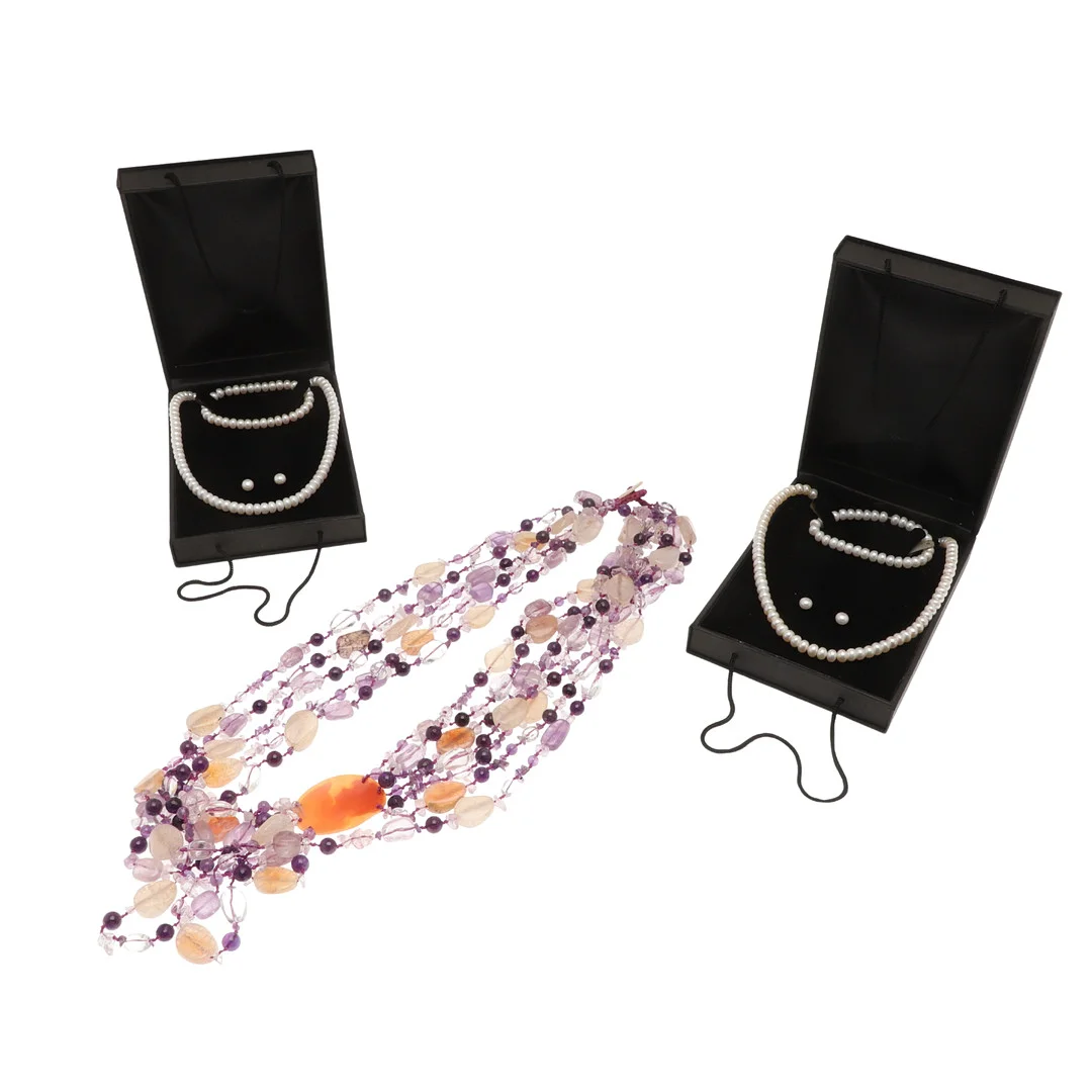 TWO CULTURED PEARL NECKLACES WITH 14CT GOLD CLASPS AND A QUARTZ AND CAMEO NECKLACE. — Necklace — Lawrences Auctioneers