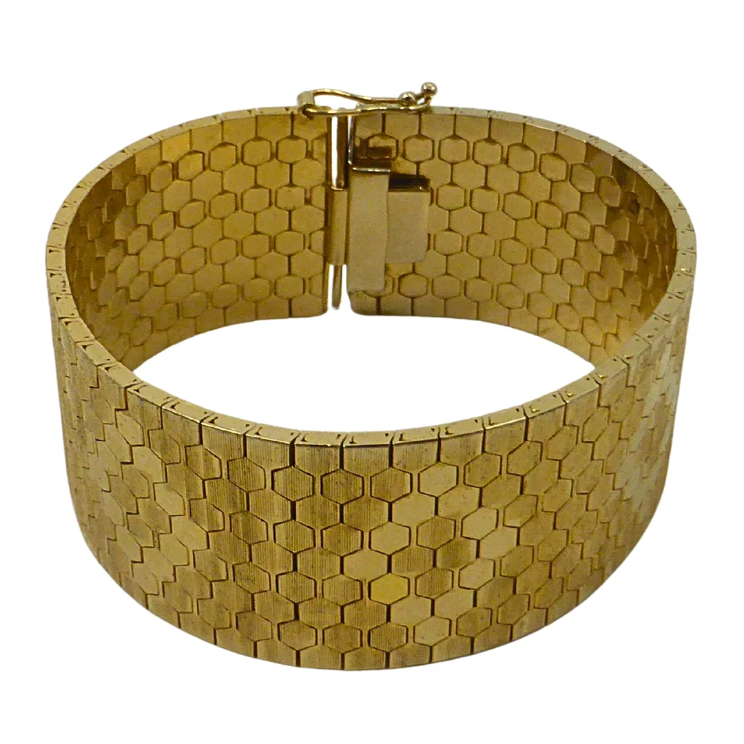 BREITES ARMBAND VERGOLDET MIT WABENMUSTER. — Bracelets — Auktionshaus Stuber's Hammerschlag
