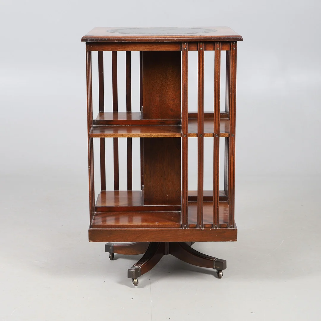A BEVAN FUNNELL 'REPRODUX' REVOLVING BOOKCASE. — Cupboards, Cabinets & Shelves — Lawrences Auctioneers