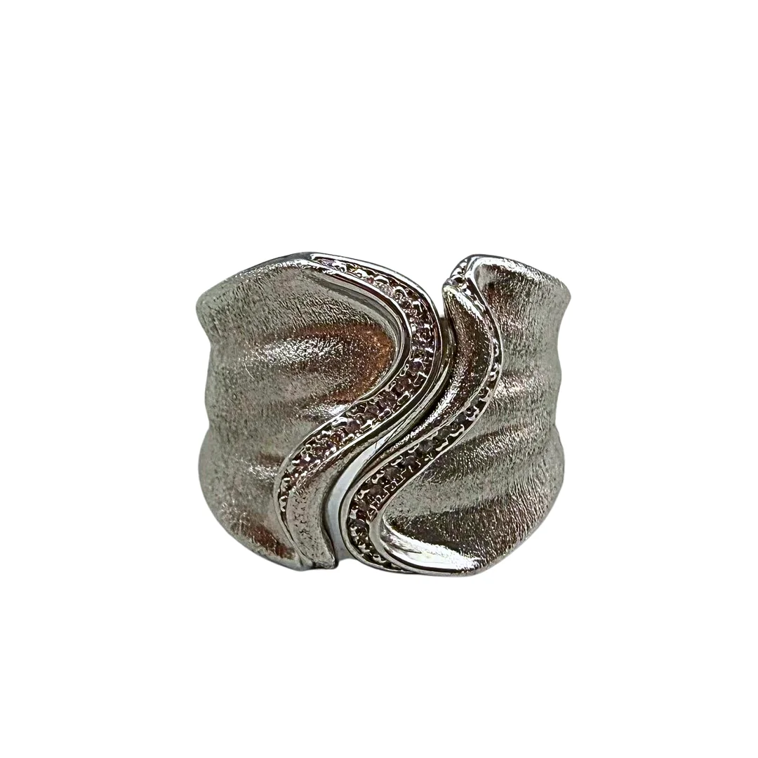 METALLRING MIT ZIERSTEINEN UND ORIGINALVERPACKUNG. — Rings — Auktionshaus Stuber's Hammerschlag