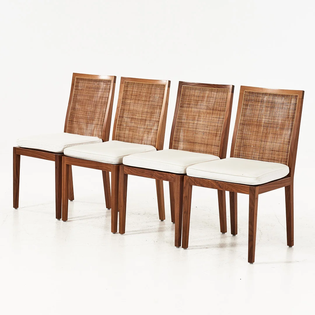 ANTONIO CITTERO. "Sem", stolar, 4 st., Flexform, Italien, valnöt, ryggar med flä'tad rotting, sitsar med vit klädsel. — Armchairs & Chairs — Stockholms Auktionsverk Magasin 5