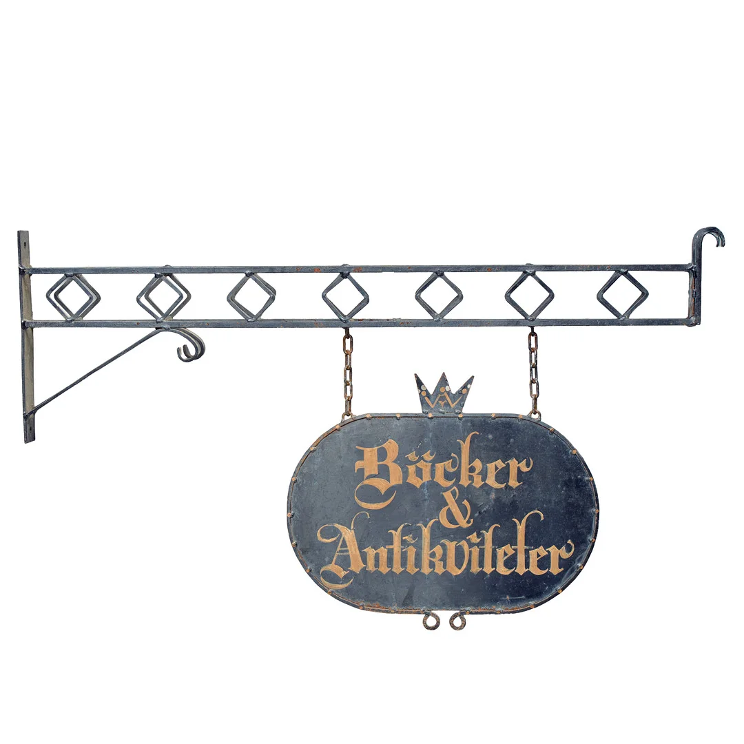 FASADSKYLT, målat järn, "böcker & antikviteter". — Advertising & Signs — Uppsala Auktionskammare