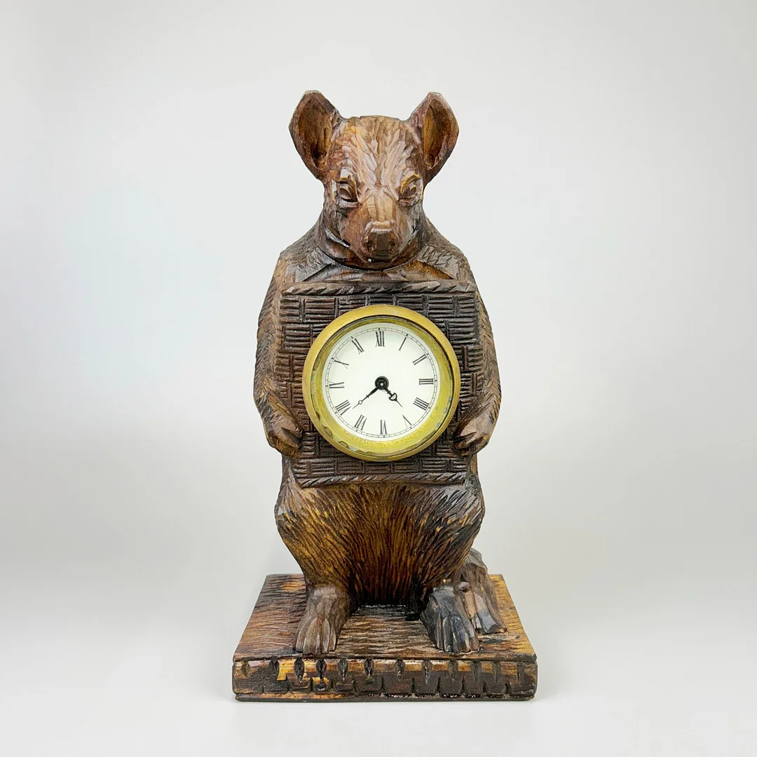 A BLACK FOREST STYLE CLOCK. — Other clocks — Chalkwell Auctions