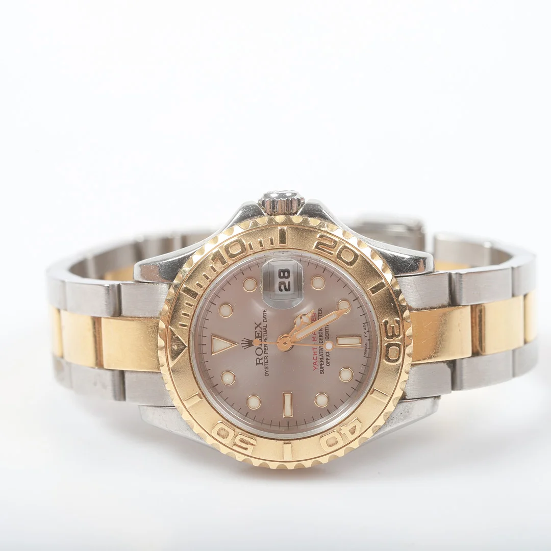 ROLEX. Damarmbandsur, Oyster Perpetual Date, Yacht-Master, guld på stål, 1999. — Wristwatches — Helsingborgs Auktionskammare