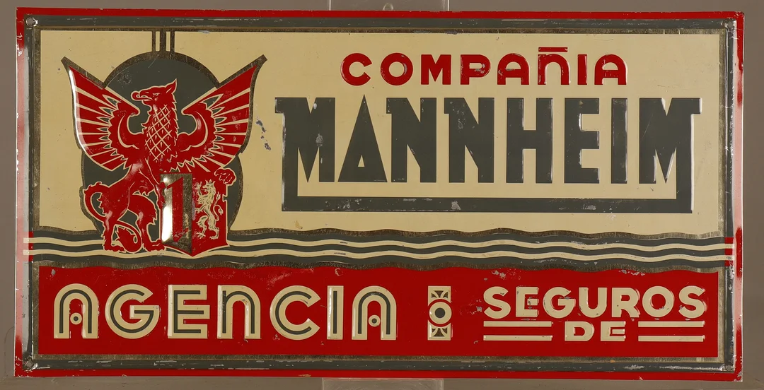 Compañía Mannheim, placa publicitaria en hojalata estampada y pintada. — Other collectables — Barcelona Auctions