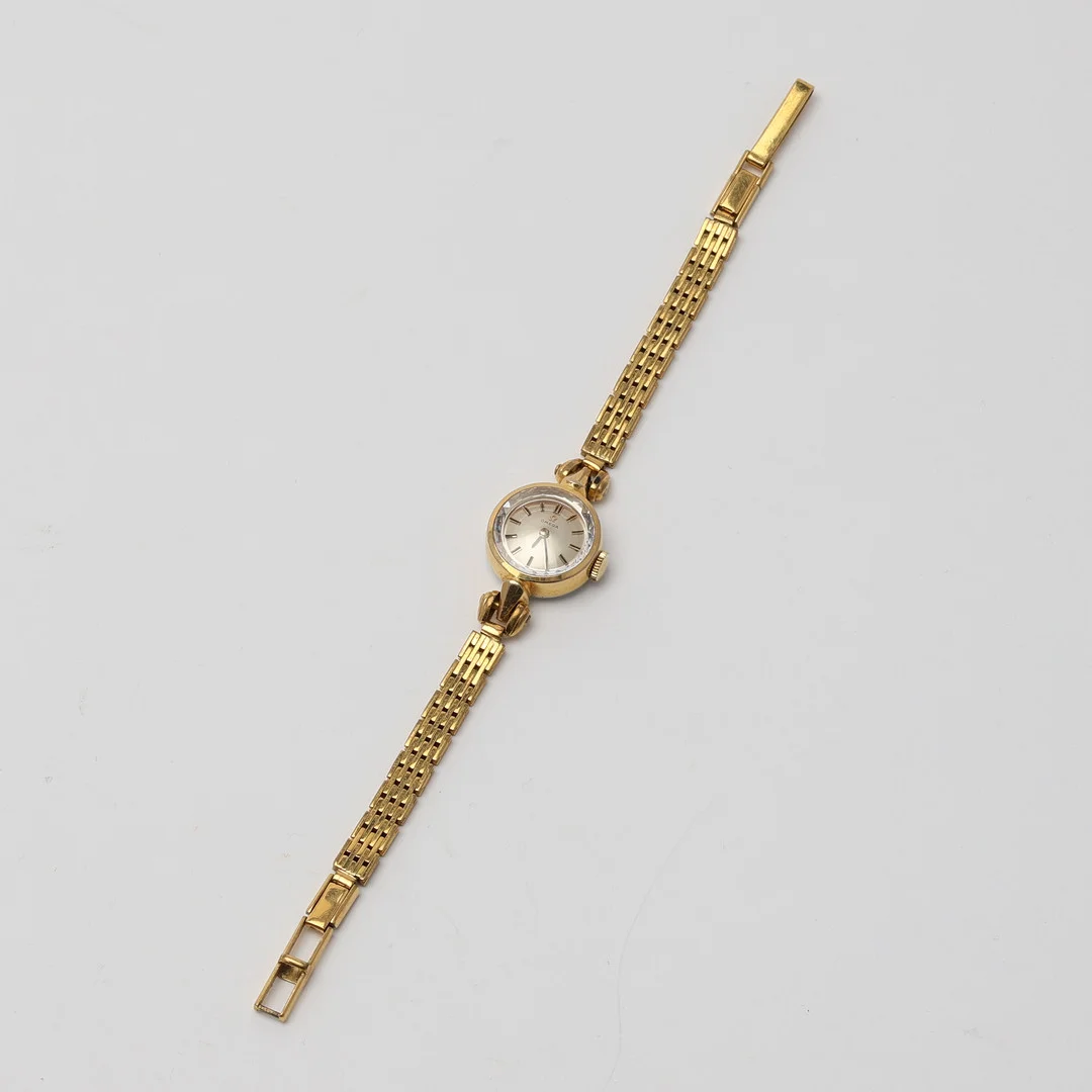 OMEGA, damarmbandsur, förgylld. — Wristwatches — Uppsala Auktionskammare