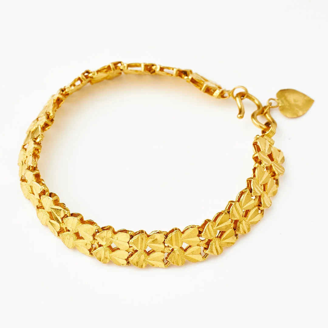 ARMBAND, ca 20-21 k guld, fanatsilänk, utländskt arbete. — Bracelets — Stockholms Auktionsverk Magasin 5