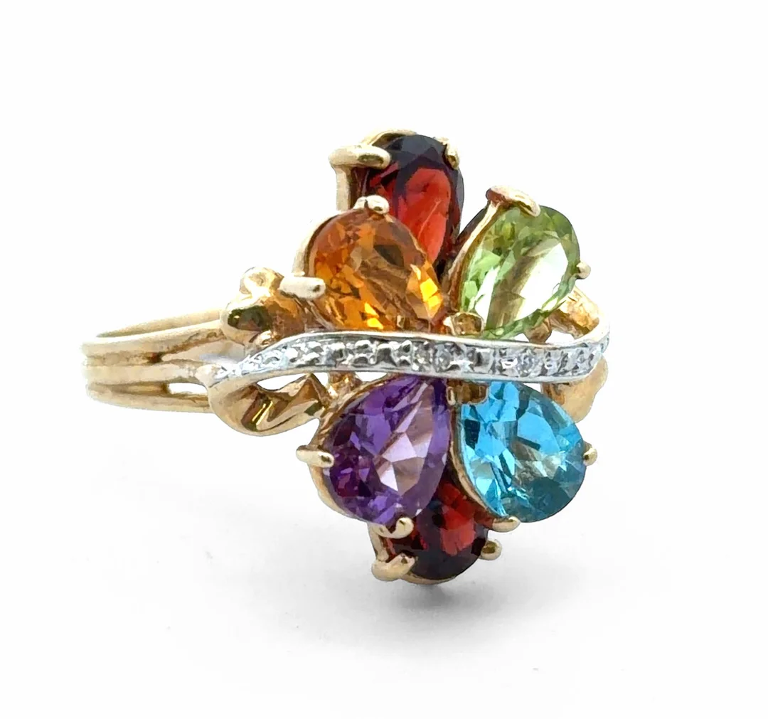 A MULTI-GEMSTONE 9CT GOLD RING. — Rings — Griffin’s Auctioneers