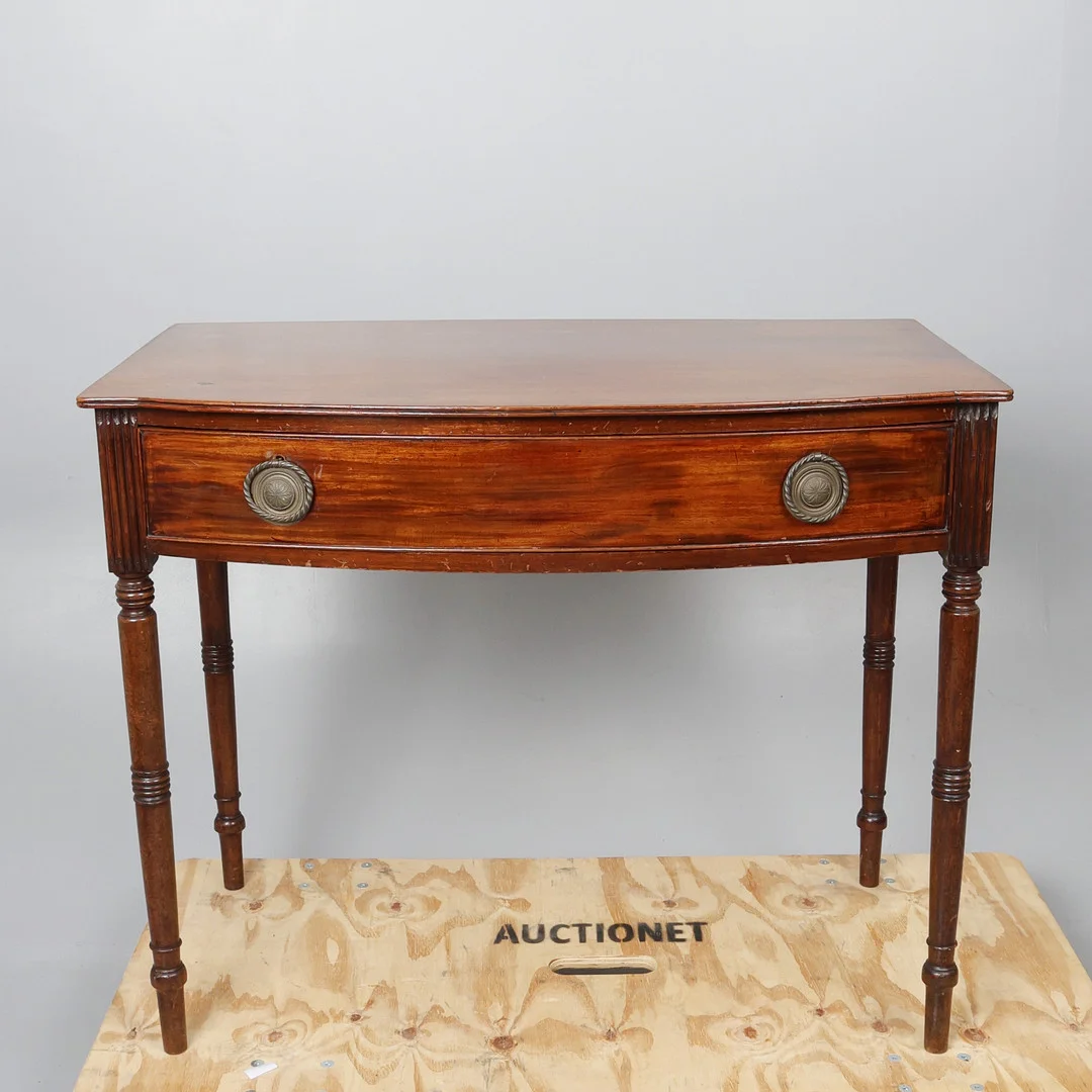 REGENCY MAHOGANY BOW FRONTED SIDE TABLE. — Tables — Young's Auctions