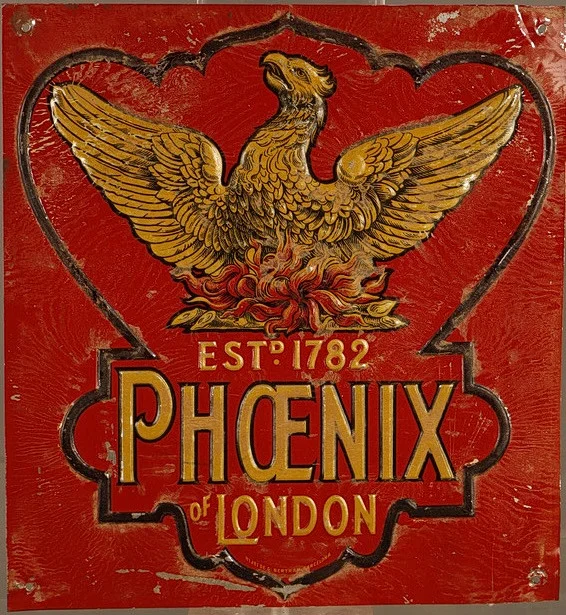 Phoenix, placa publicitaria en hojalata estampada y pintada. — Other collectables — Barcelona Auctions