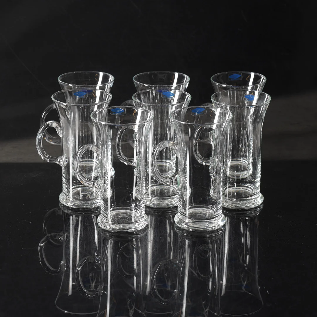 HEIKKI ORVOLA. Irish Coffee-glas med skedar, 16 delar, glas & metall, Nuutajärvi, Finland. — Utility glass — Gomér & Andersson Nyköping