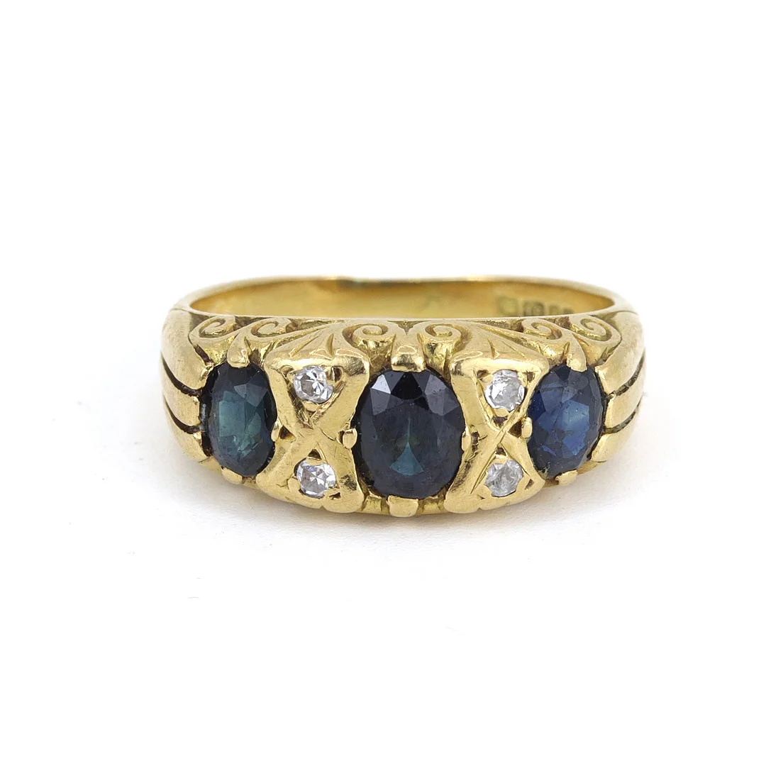 18CT GOLD SAPPHIRE & DIAMOND RING. — Rings — Chalkwell Auctions