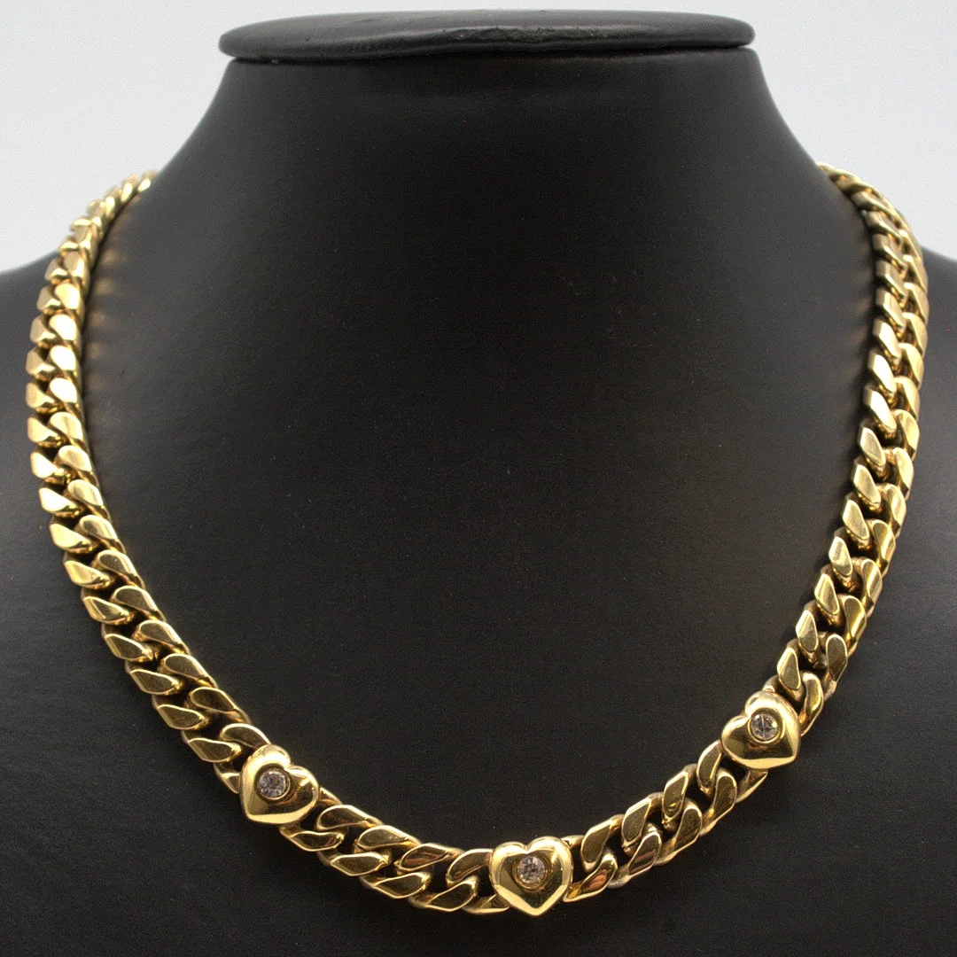 VERGOLDETE DESIGNER FLACHPANZERKETTE, MIT DREI WEISSEN FARBSTEINEN BESETZT, 20. JAHRHUNDERT. — Necklace — Kunst- und Auktionshaus Kleinhenz