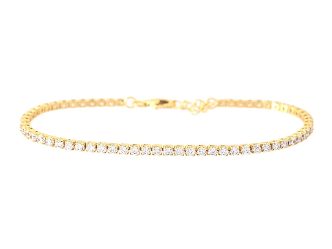 TENNISARMBAND, förgyllt sterlingsilver, cubic zirconia, längd 15 cm-18 cm, vikt ca 2,9 g. — Smycken/Armband — Kaplans