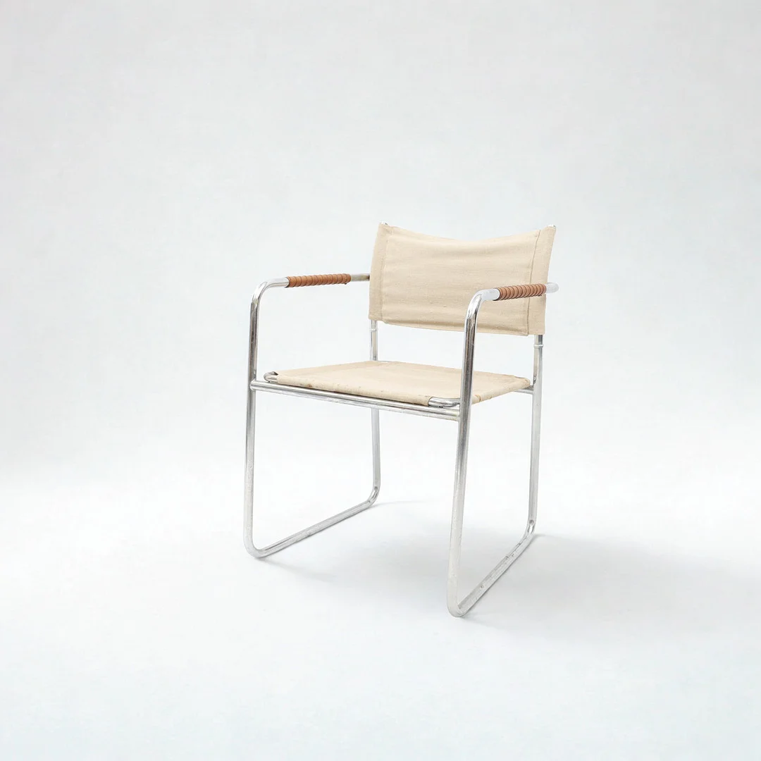 KARIN MOBRING. KARMSTOL, "Amiral" Kromat stålrör, linneklädsel och läderlindade armnlän. — Armchairs & Chairs — Falun Auktionsbyrå