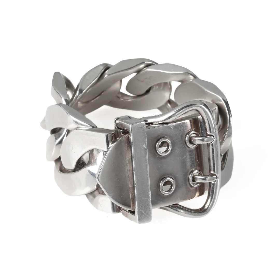 Hermés: A large 'Boucle Sellier Inflexible' bracelet of sterling silver. Length 18 and 19 cm. — Jewellery/Bracelets — Lauritz