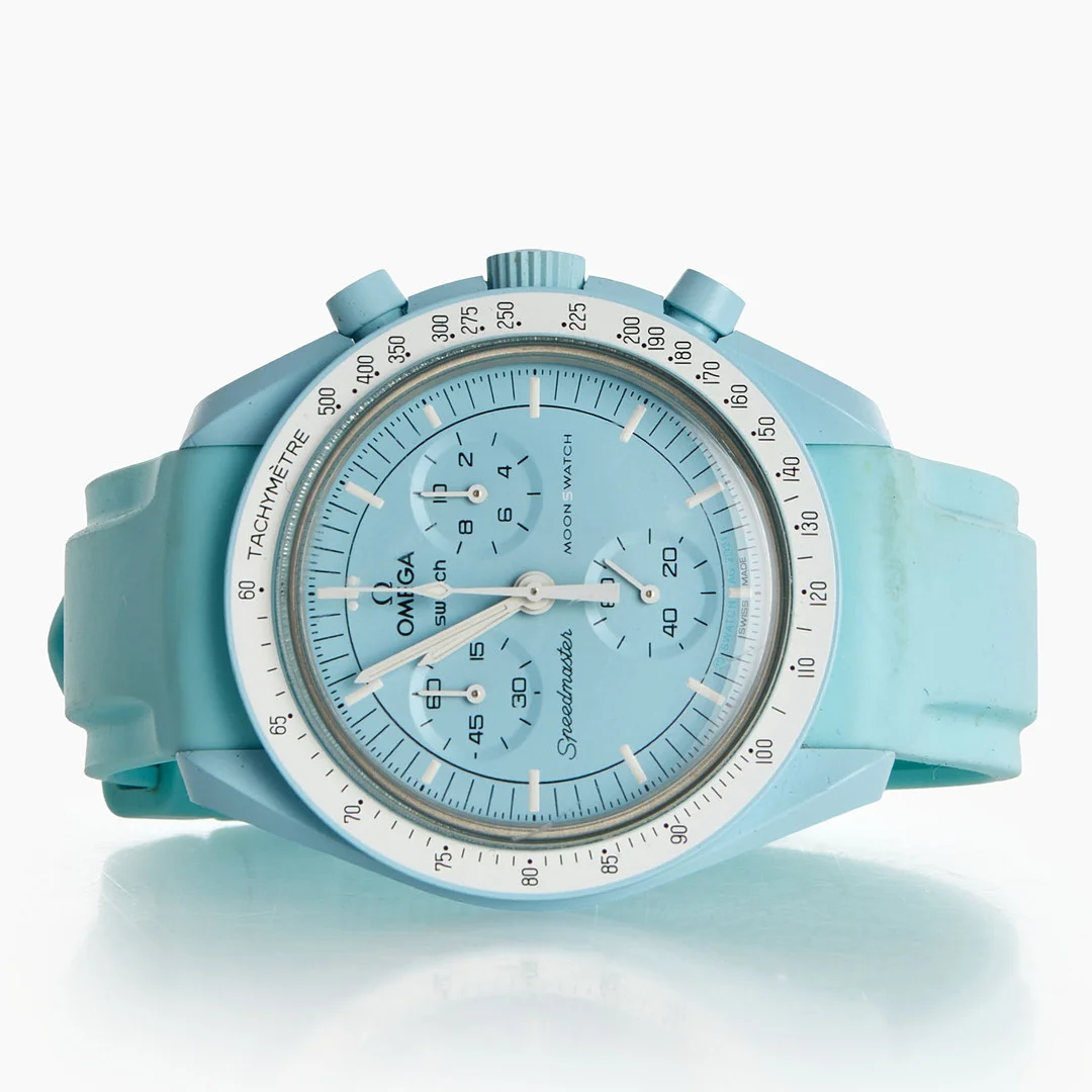 OMEGA / SWATCH. Armbandsur, Moonswatch, "Mission to Uranus", bioceramic, kvartsur, i box. — Wristwatches — Crafoord Auktioner Stockholm