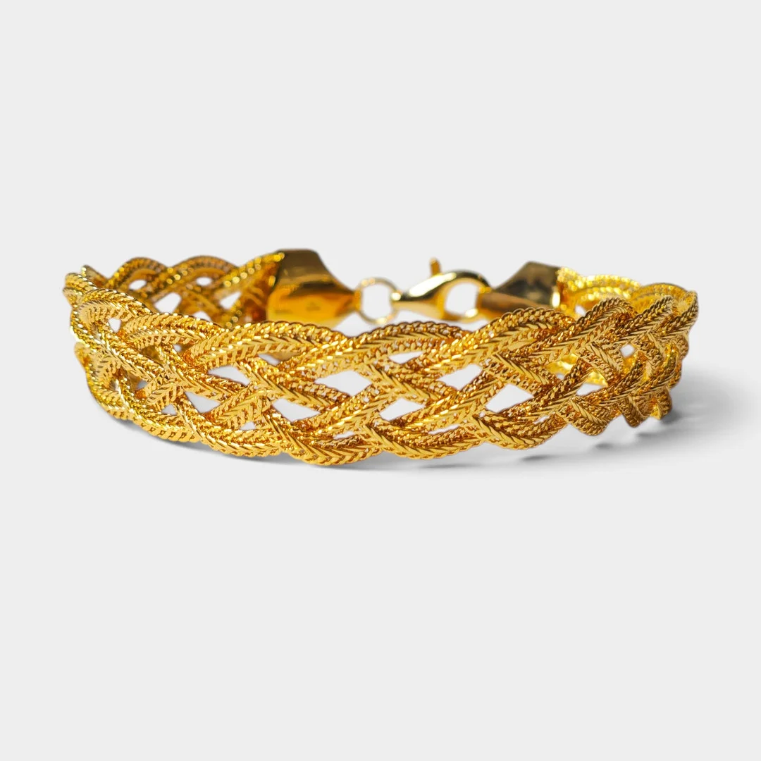 Pulsera trenzada en plata y baño de oro. — Bracelets — Barcelona Auctions