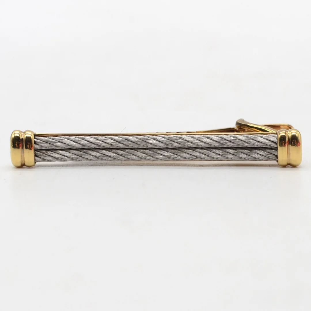 PHILIPPE CHARRIOL. KRAWATTENKLAMMER, METALL VERGOLDET, 20. JAHRHUNDERT. — Brooches & Pendants — Kunst- und Auktionshaus Kleinhenz