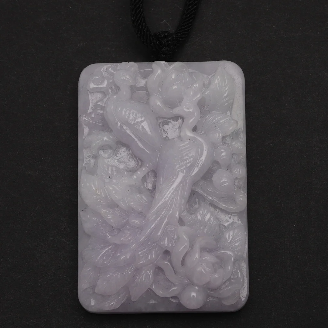 A LAVENDER JADE CARVED PENDANT. — Brooches & Pendants — Lawrences Auctioneers