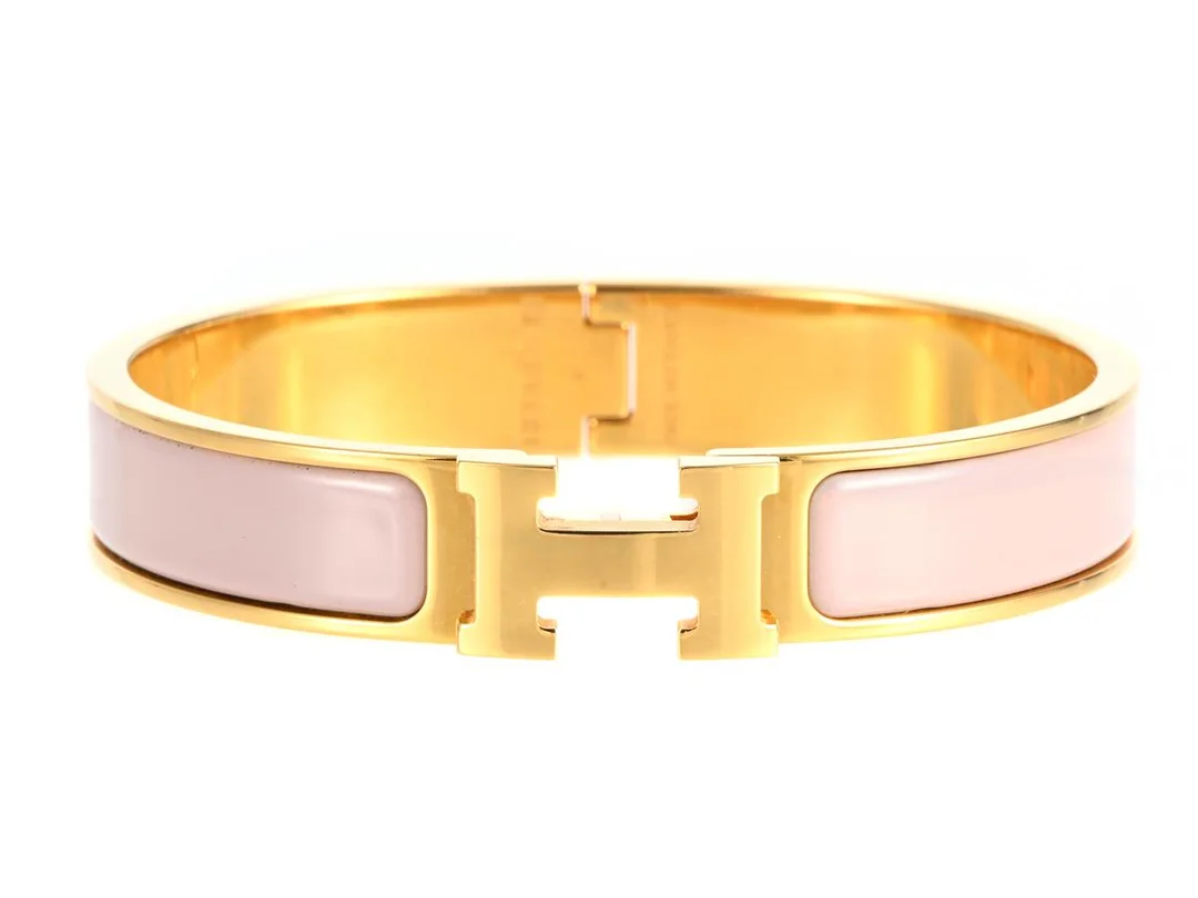 ARMRING, HERMÈS, Clic H Bracelet, guldpläterad, rosa emalj, diameter 6 cm, smyckespåse, ask. — Smycken/Armring — Kaplans