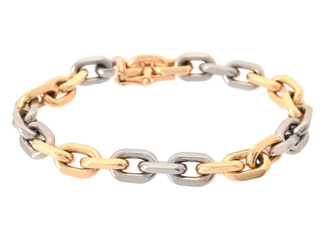 ARMBAND, 18K guld/vitguld, spetsankarlänk, Clareus guldsmeds AB, Stockholm, längd 19 cm, vikt 50,4 g. — Smycken/Armband — Kaplans
