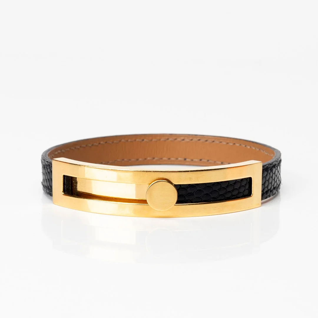 HERMÈS. Armband, läder och guldplätterad metall, "Pousse-Pousse", Paris, Frankrike. — Vintage & Designer Fashion — Auktionshuset Kolonn