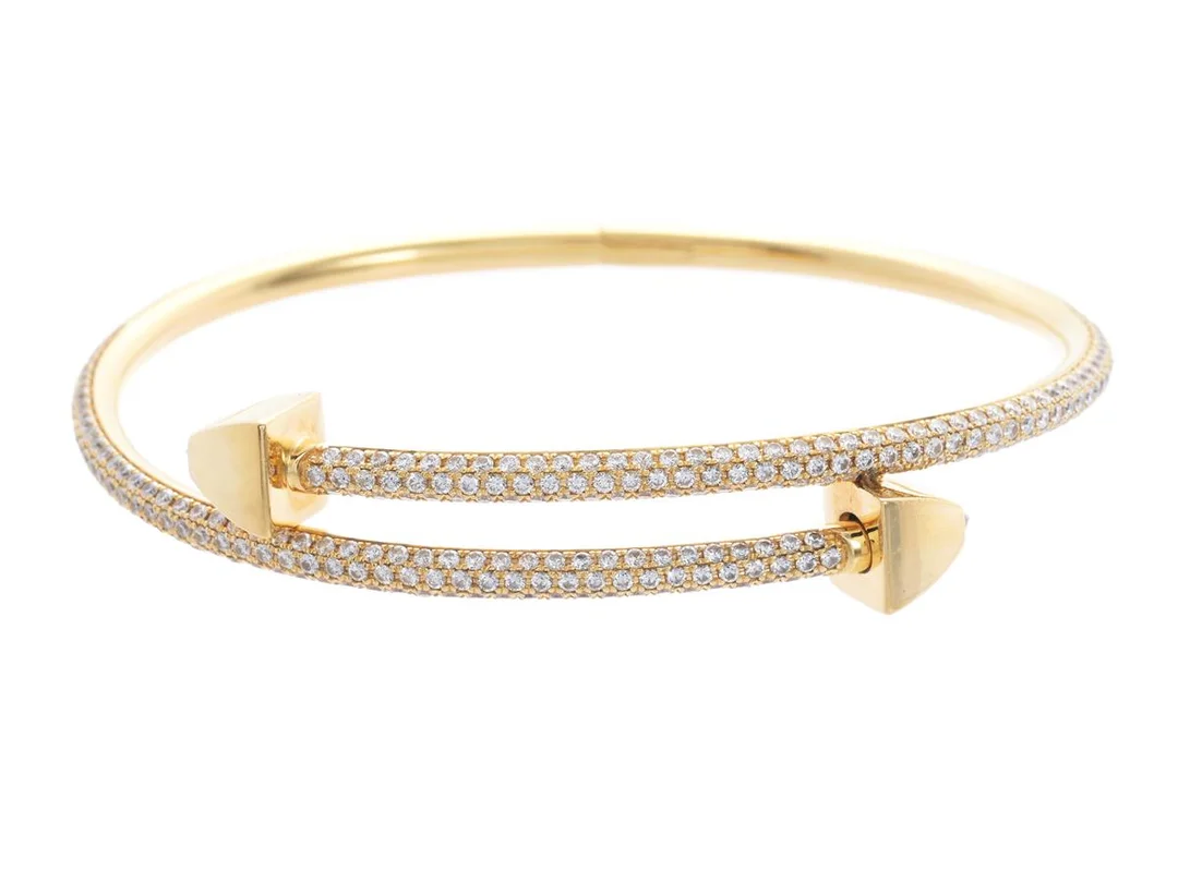 RARE JEWELRY, armband, Gaia Twin Pavé, 18K guld, briljantslipade diamanter 2,42 ctv, ca TW/VS-SI, 2 prinsesslipade diamanter 0,06 ctv, stl M vikt 29,5 g. — Smycken/Armband — Kaplans