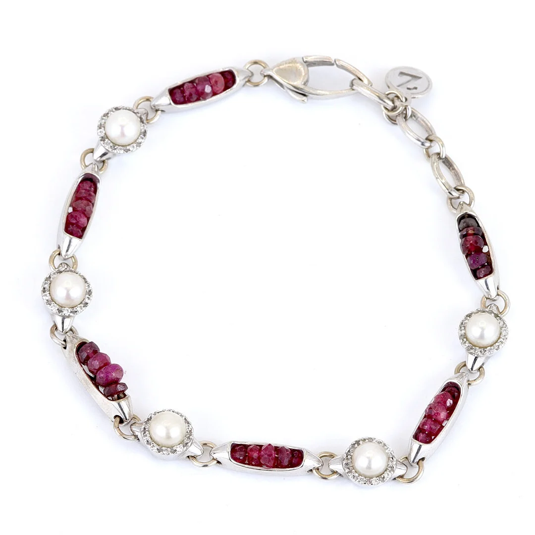 18CT GOLD RUBY, DIAMOND & PEARL BRACELET. — Bracelets — Chalkwell Auctions