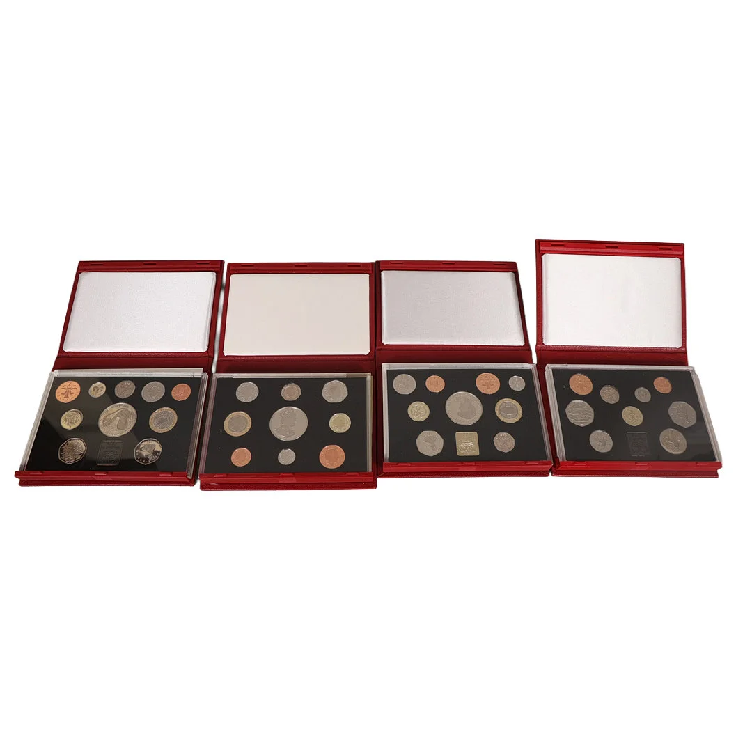 FOUR ROYAL MINT UNITED KINGDOM PROOF COIN COLLECTIONS (4). — Coins & Banknotes — Bishop & Miller