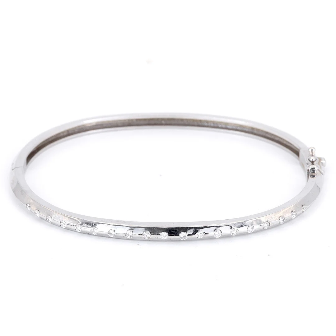 18CT DIAMOND SET BANGLE. — Bracelets — Chalkwell Auctions