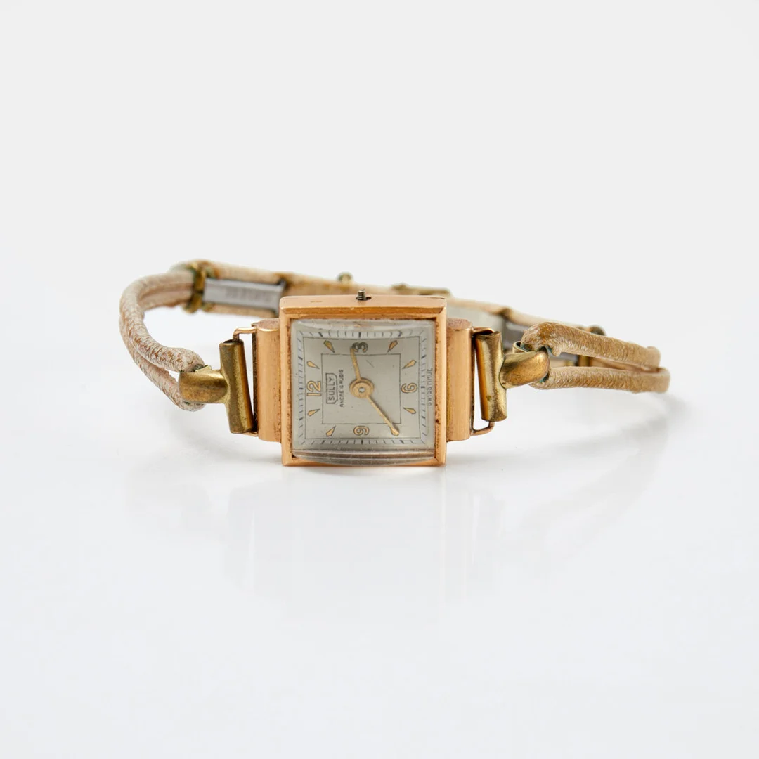 SULLY (Swiss Made), boett i 18 k, 16x16 (24) mm, omkrinng 1900-talets mitt. — Wristwatches — Stockholms Auktionsverk Sickla
