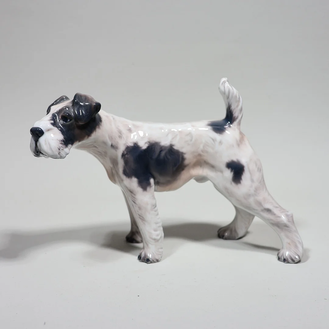 DAHL JENSEN. figurin #1009, terrier i porslin, Danmark. — European — Markus Auktioner