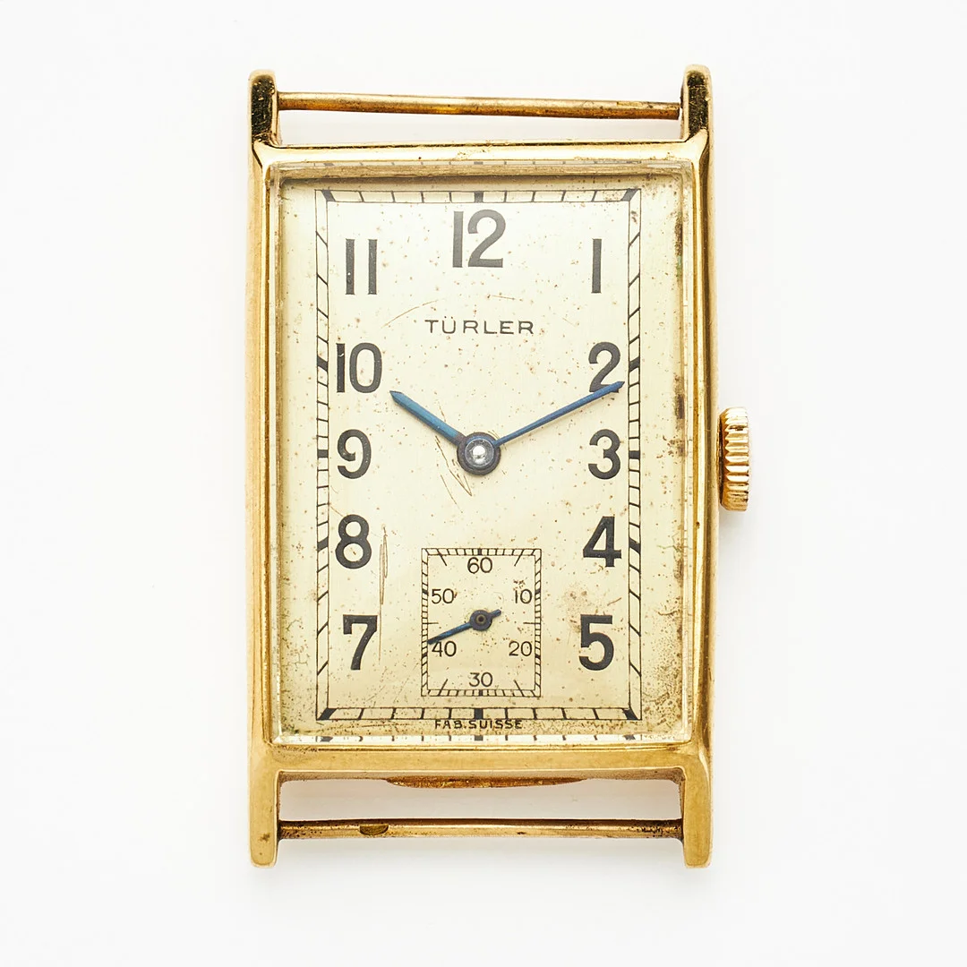 TURLER, armbandsur, 22 x 30 mm, 18K guld, ca 1940. — Wristwatches — Stockholms Auktionsverk Magasin 5