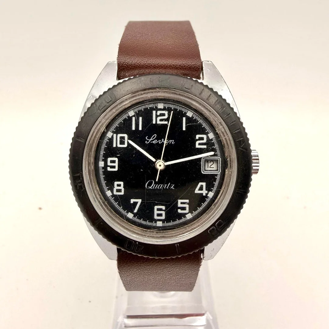 LEVAN, armbandsur, dykarklocka, 1970/80-tal, quartz, stål. — Wristwatches — Skandia Auktion