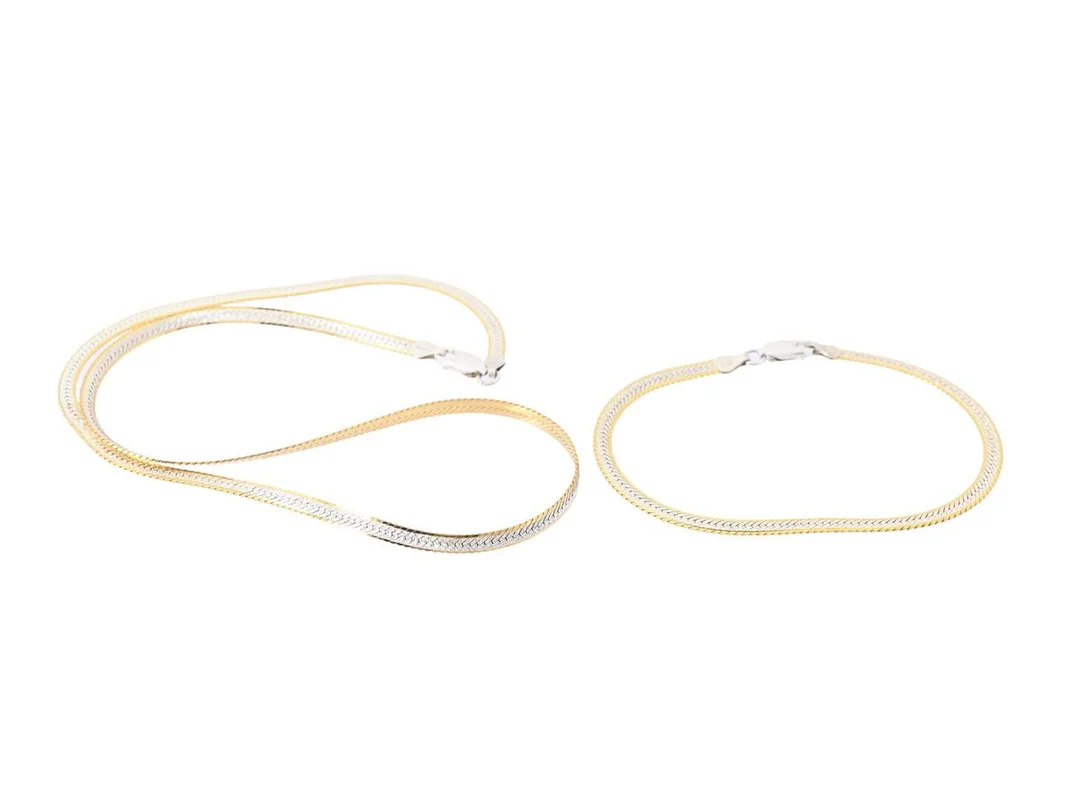 SMYCKESET, sterlingsilver, halskedja, armband, delvis förgyllt, halvstel länk, längd 45/19 cm, totalvikt 11 g. — Smycken/Smyckeset — Kaplans