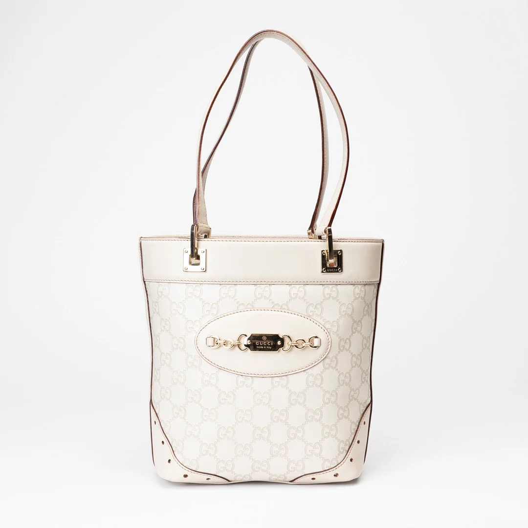 GUCCI. Handväska, "Gucci Guccissima Punch Tote", design Frida Giannini omkring 2004/2005. — Vintage & Designer Fashion — Auktionshuset Kolonn