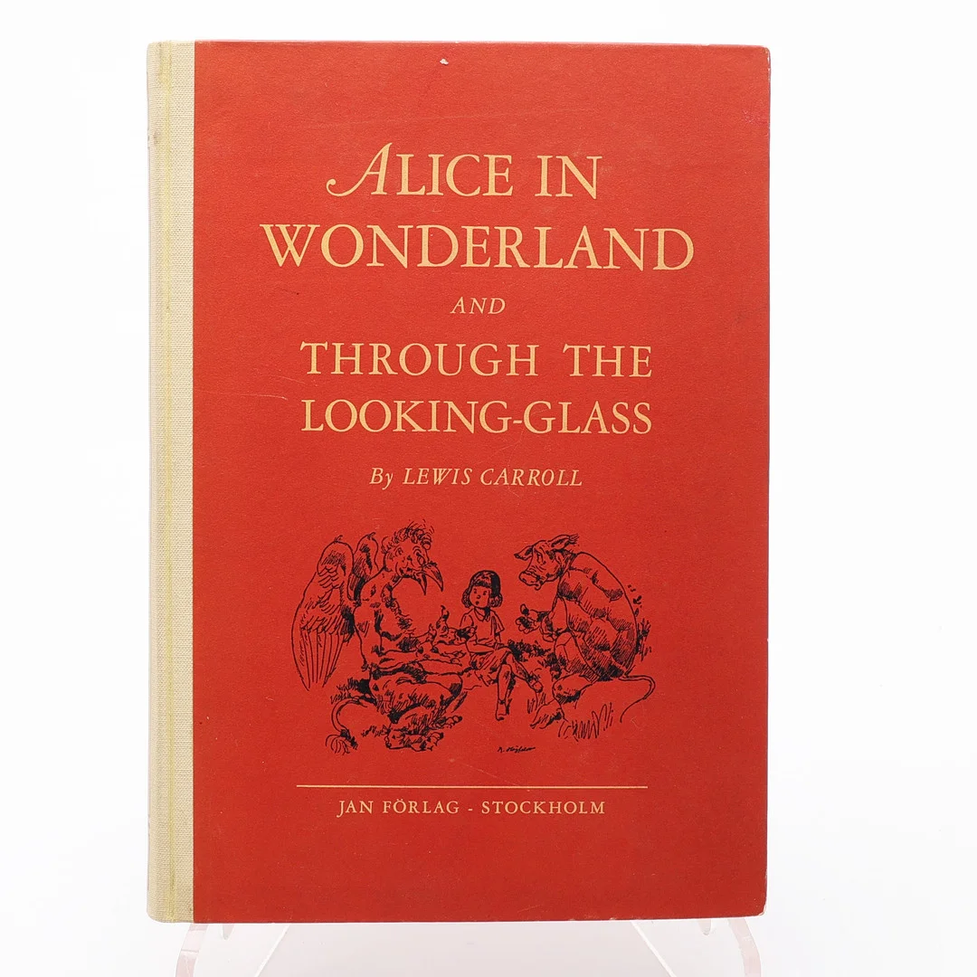 LEWIS CARROLL'S ALICE IN WONDERLAND OCH THROUGH THE LOOKING-GLASS ILLUSTRERD AV ROBERT HÖGFELDT 1939. — Books — Crafoord Auktioner Lund
