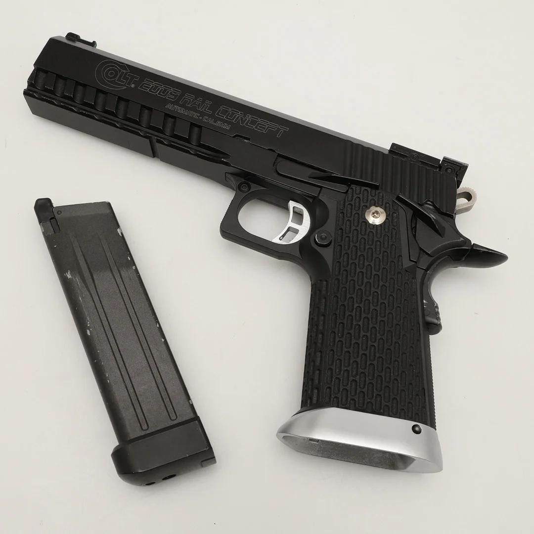 A CYBERGUN X COLT 2009 RAIL CONCEPT HI-CAPA GREEN GAS BLOWBACK AIRSOFT PISTOL. — Airguns — Lawrences Auctioneers