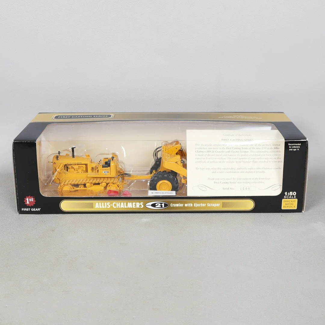 A FIRST GEAR LIMITED EDITION FIRST CASTING SERIES OF AN ALLIS-CHALMERS HD-21 CRAWLER WITH EJECTOR SCRAPER. — Model cars — Bishop & Miller