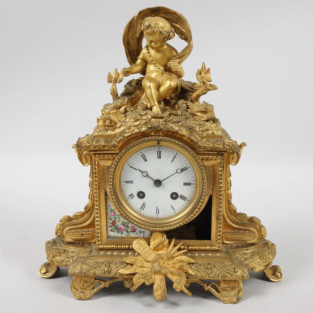 BORDSPENDYL, förgylld brons, Miroy Freres, Frankrike, 1800-talets senare del. — Mantel clocks — Ekenbergs Auktioner