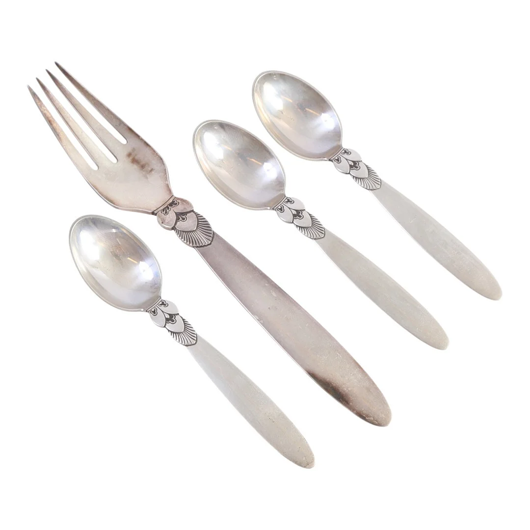 GUNDORPH ALBERTUS (1887-1996). Georg Jensen. Fire dele "Kaktus" bestik af sterlingsølv (4). — Silver — Bidstrup Auktioner