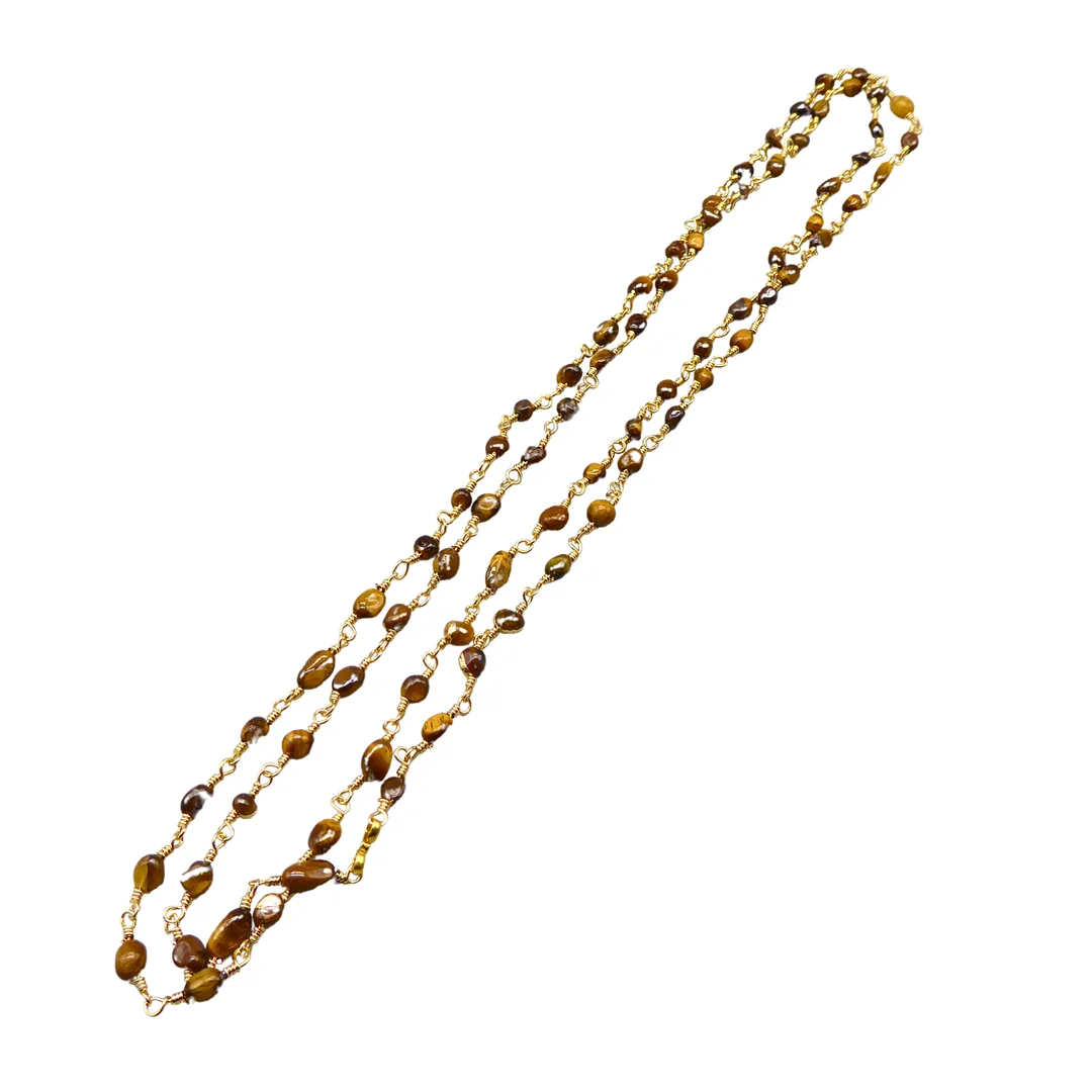 NATÜRLICHE EDELSTEIN HALSKETTE MIT METALL IN DER FARBE GOLD. — Necklace — Auktionshaus Stuber's Hammerschlag