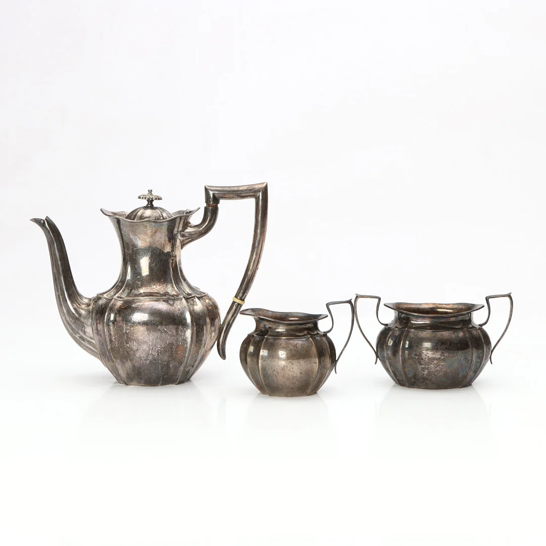 MGAB, KAFFESET, TRE DELAR. Uppsala, 1933-35. Total vikt ca 980 gram. — Silver — Skånes Auktionsverk
