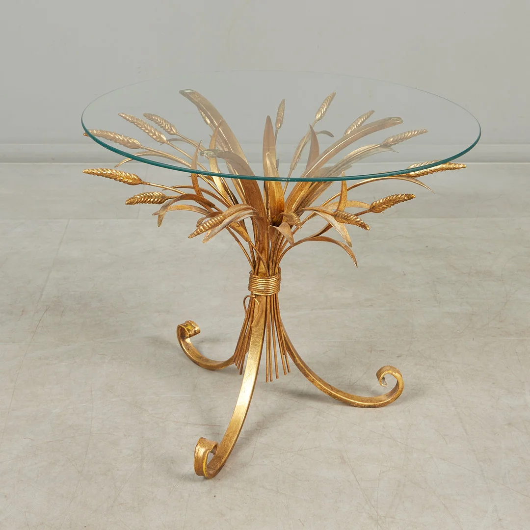 HANS KÖGL. IM STIL VON. Beistelltisch / Coffee Table 'Coco Chanel', Messing, Glas, 1970er Jahre. — Coffee Tables — Stockholms Auktionsverk Köln