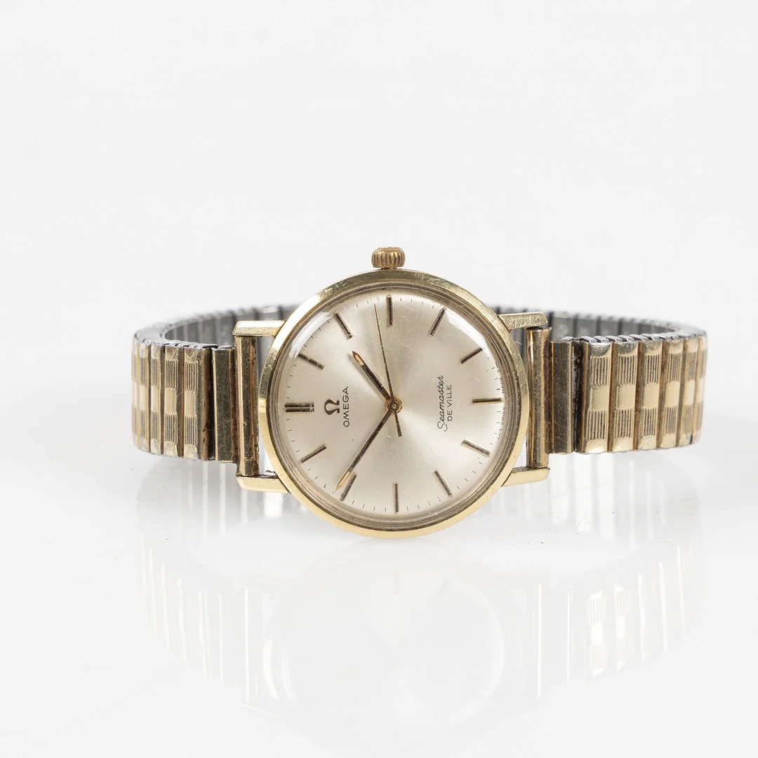 OMEGA, Seamaster, De Ville, armbandsur, 34,5 mm, guld på stål, ca 1969. — Wristwatches — Stockholms Auktionsverk Helsingborg