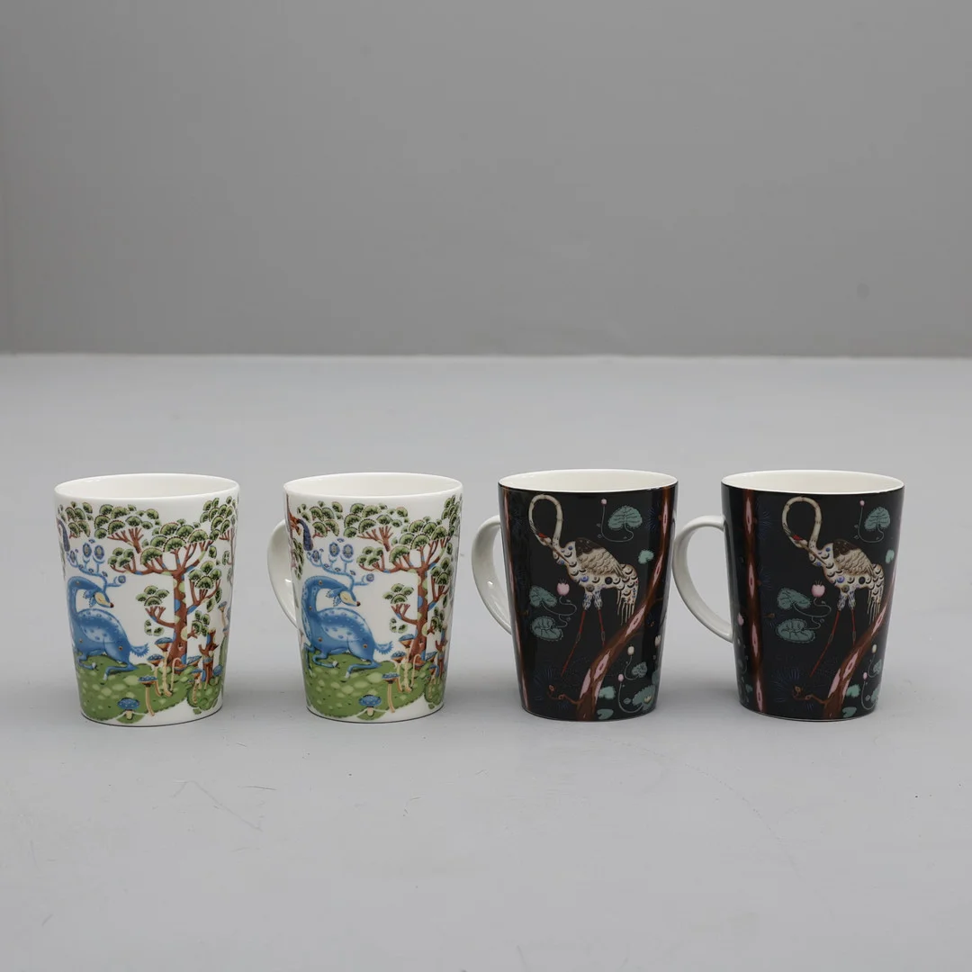 MUGGAR, 4st, porslin, "Taika", Heikki Orvola, Iittala, 2000-tal. — European — Södermanlands Auktionsverk