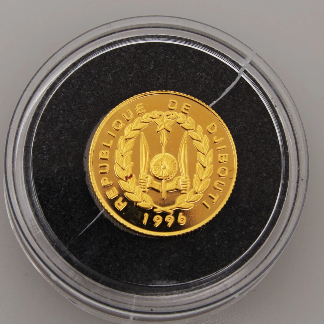MYNT, guld, 250 DIF, Djibouti, 1996. — Coins & Banknotes — Växjö Auktionskammare