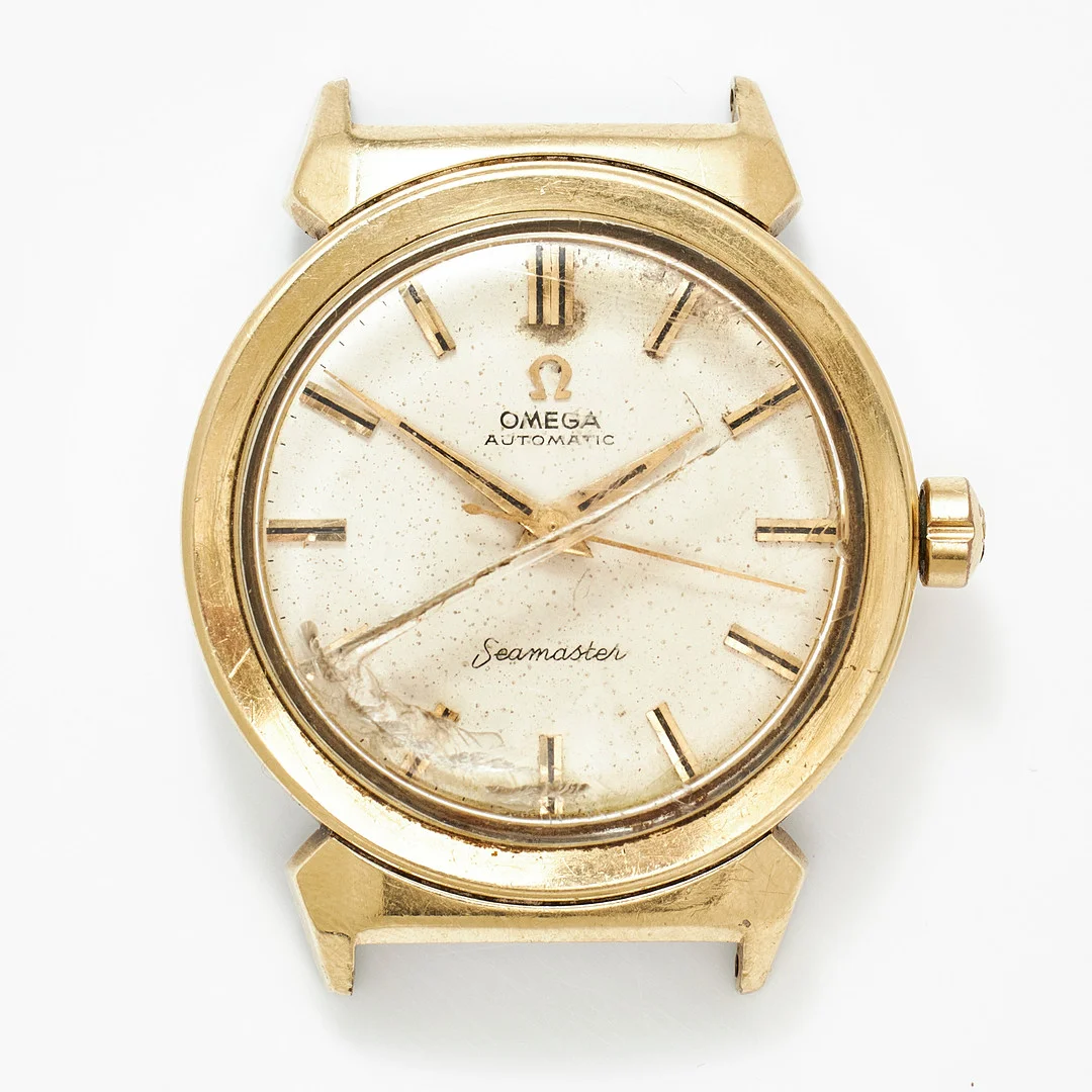 OMEGA, Seamaster, armbandsur, 34 mm, guld på stål, ca 1958. — Wristwatches — Stockholms Auktionsverk Magasin 5
