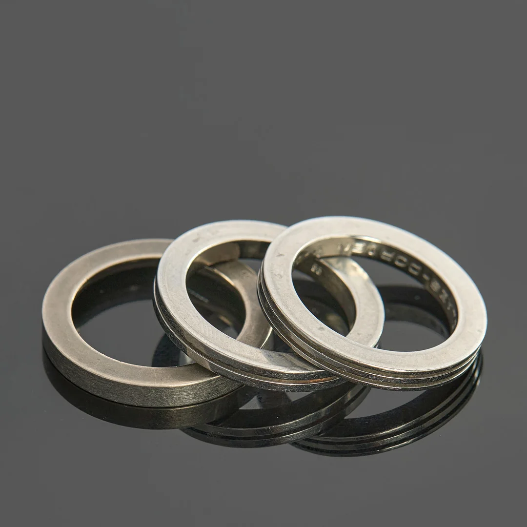 CARL DAU. Ringar, 3 st, titanium, tyskland. — Rings — Crafoord Auktioner Stockholm